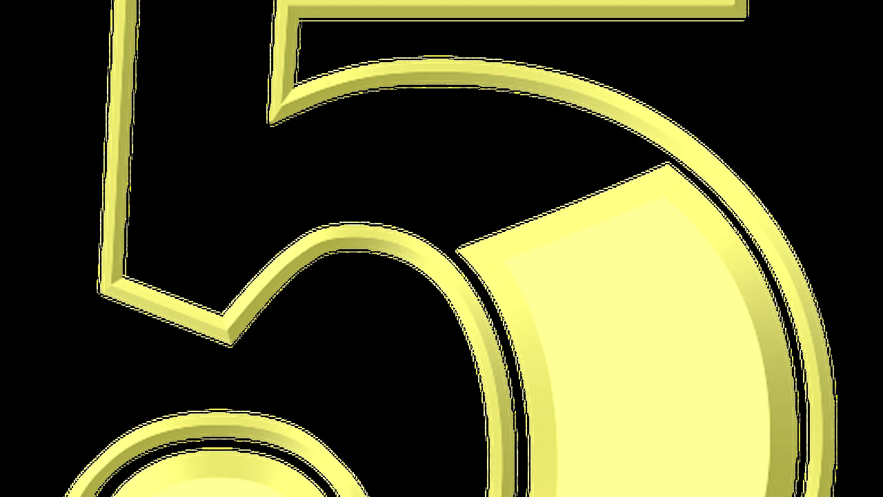 overhead view of corned beef sliced and on a platter with cabbage, potatoes, and carrots