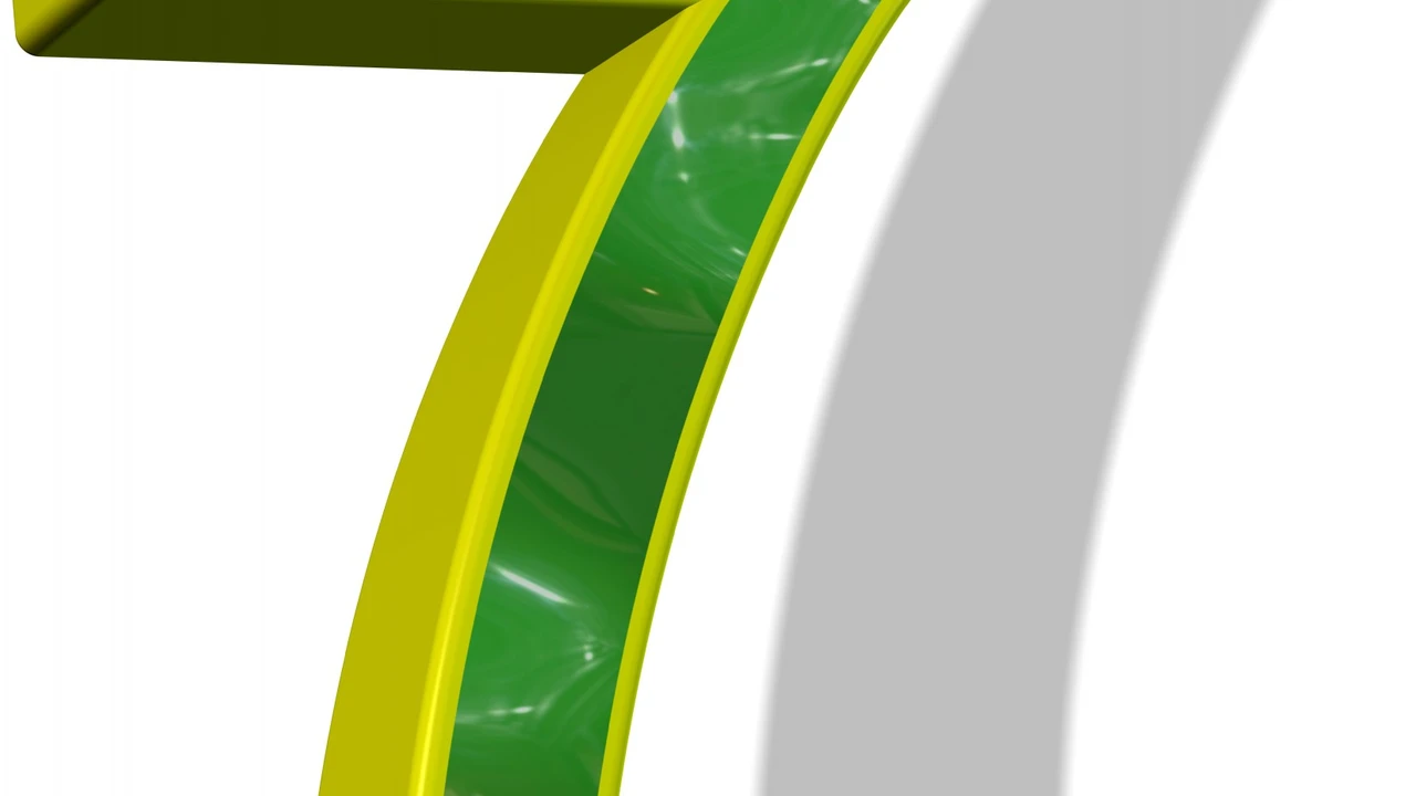 Close up on a plate of mashed potatoes, topped with baked pork chops with cream of mushroom soup, and a side of green beans.